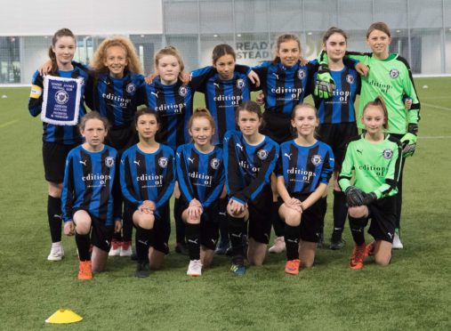 Under 13 girls team bring home the Scottish Cup.