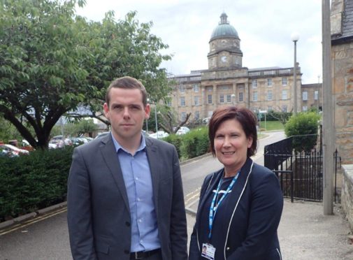 Douglas Ross and Amanda Croft outside Dr Gray's Hospital