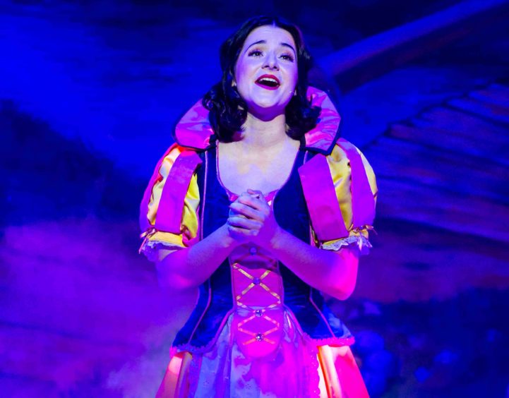 Jenna Innes onstage as Snow White during a 2018 HMT Aberdeen pantomime performance. 