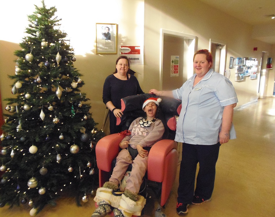 Dee View Court resident Kerry helped put up the centre's tree.