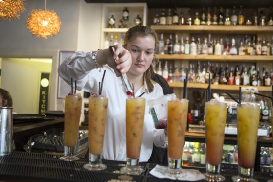 Charleston pupil Kirsty Hay preparing a mocktail at the event hosted in Inverness' The White House