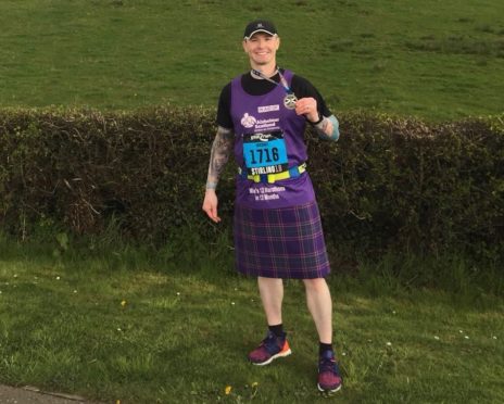 Mike Inglis in his Alzheimer Scotland tartan kilt.