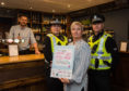 Police launch Ask for Angela campaig.

Pictured left to right: Marek Marusinex (Bar Manager) PC Nicola Curley, Joanne Larsen (Licensing Standards Officer for Moray Council) and PC Jad Leach