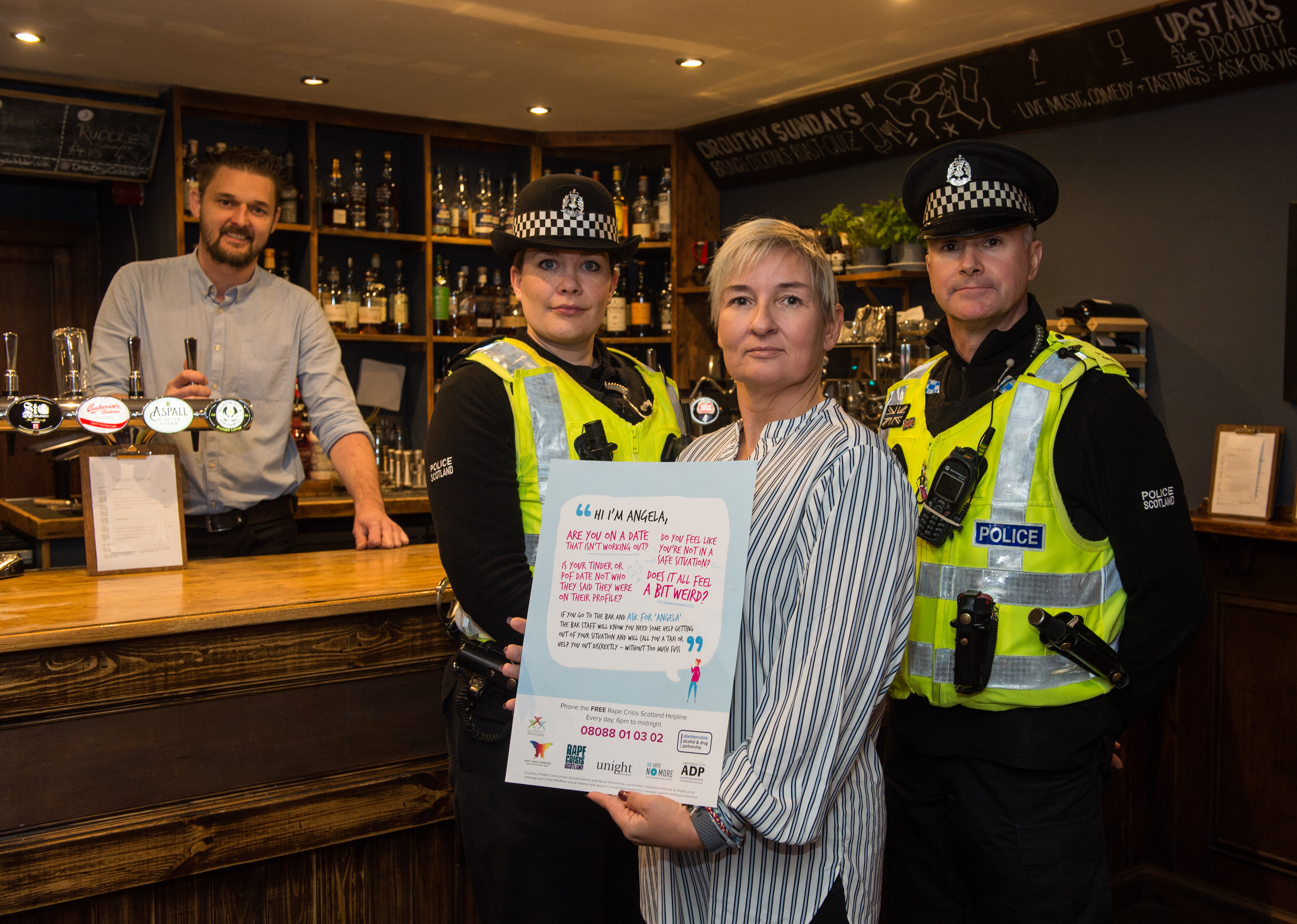 Police launch Ask for Angela campaig.

Pictured left to right: Marek Marusinex (Bar Manager) PC Nicola Curley, Joanne Larsen (Licensing Standards Officer for Moray Council) and PC Jad Leach