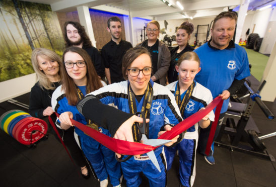 Three world champions and three world medal holders from Forty Four's Sfear kickboxing group cut the opening ribbon