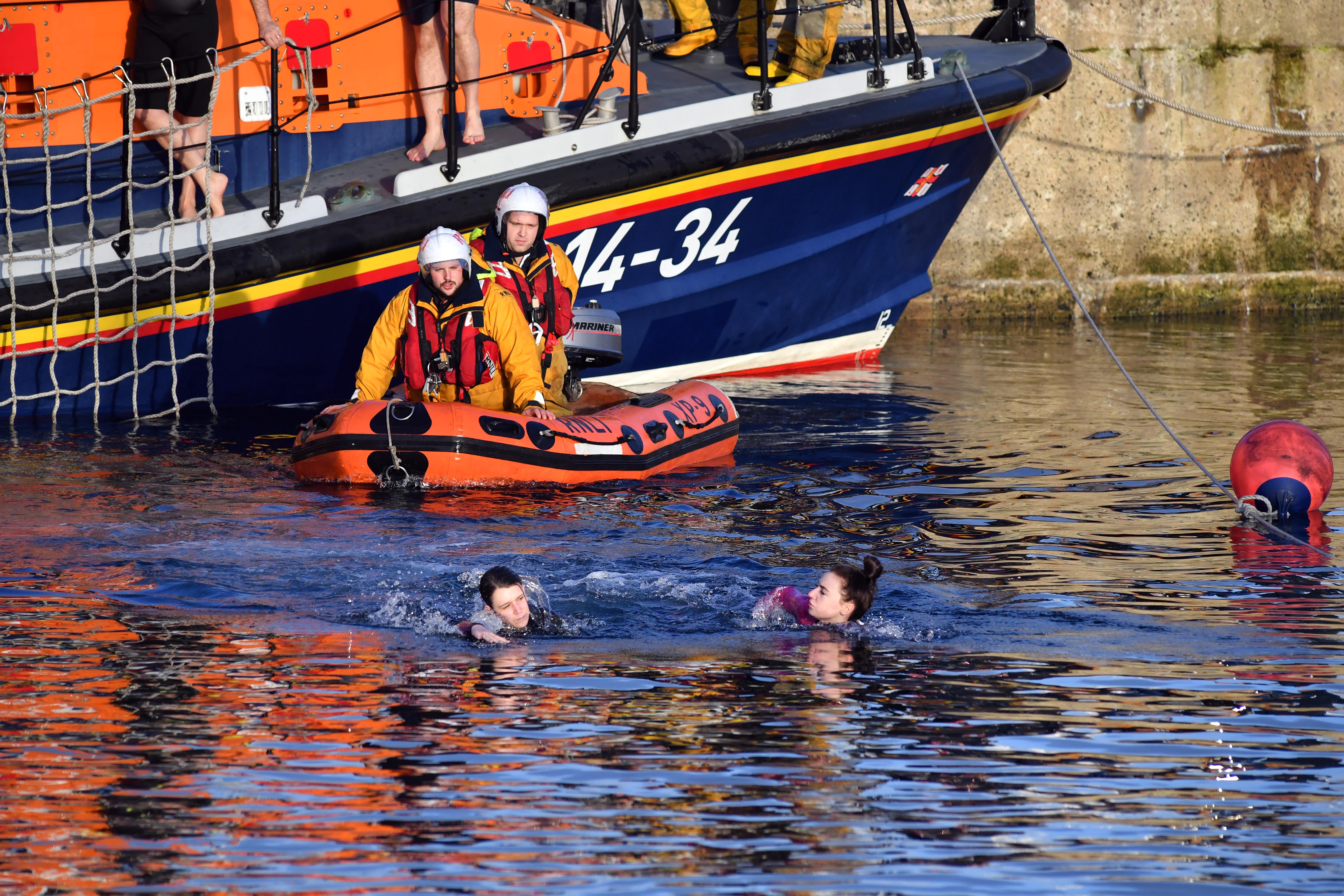 Swimmers brave the almost tropical six degree temperature in the Fraserburgh RNLI Boxing Day Swim