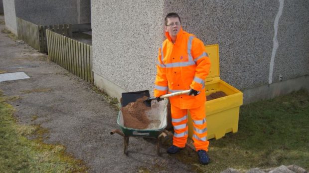 Paul Cannop from Thurso takes to the streets to lay grit to help safeguard local residents.
