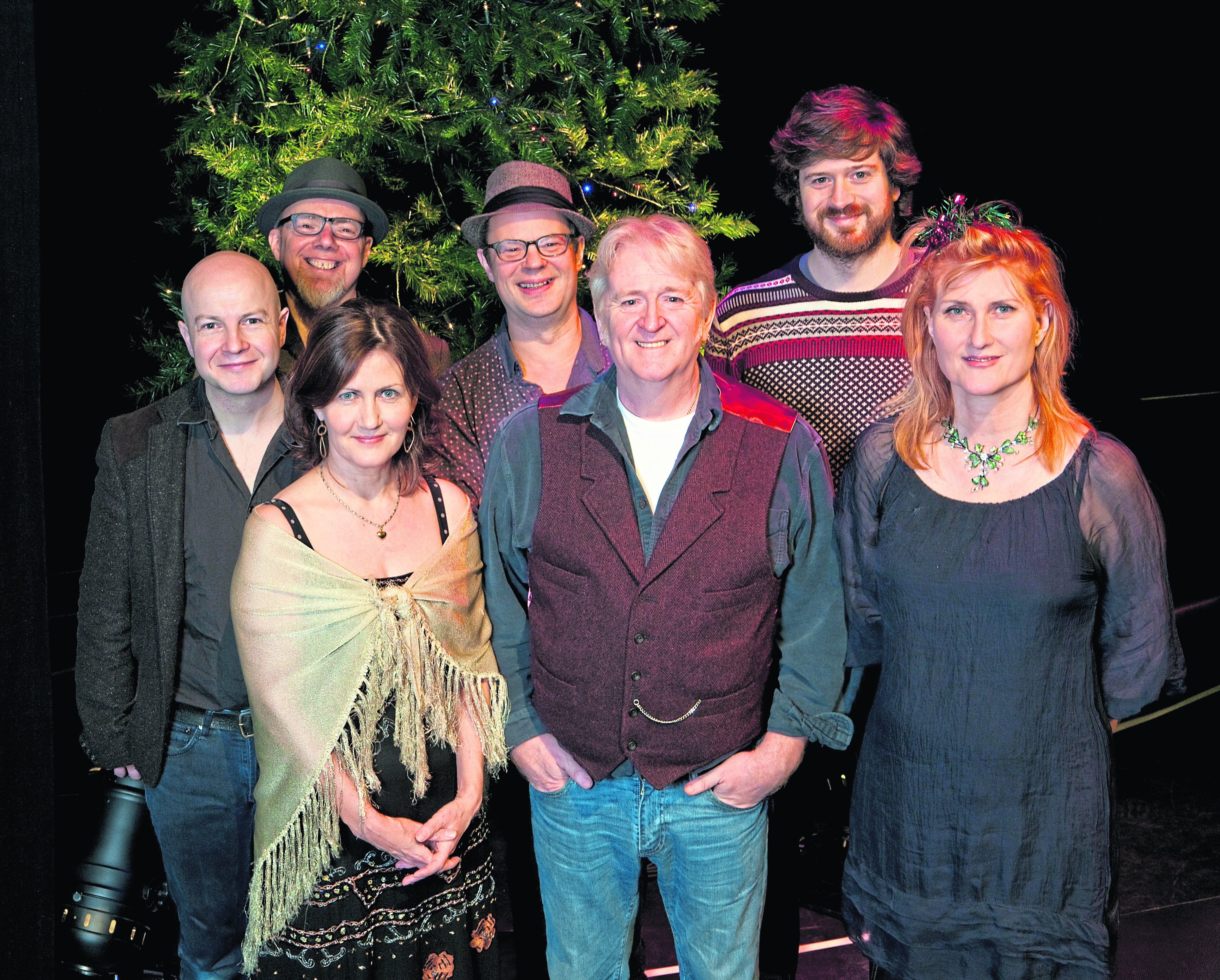 John McCusker, Karen Matheson, Ian Carr (back), Kevin McGuire (back), Phil Cunningham (front centre), Kris Drever and Eddi Reader.
