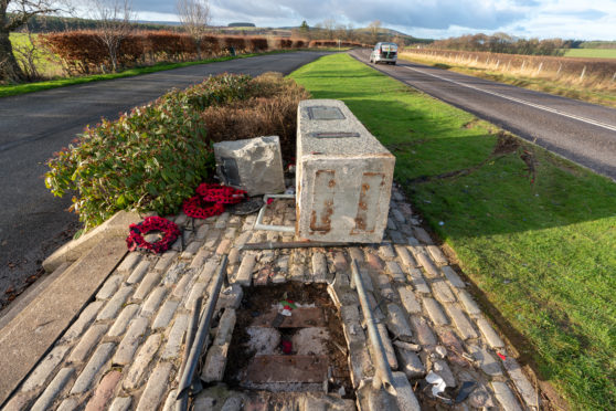 This is a picture from the scene of the WW11 RAF Banff Strike Wing Memorial at Boyndie, between Portsoy and Banff on a lay by at the A98 in Aberdeenshire, Scotland. The Monument has been hit by a vehicle at speed, knocking it from iots mounting and making t turn in 90 deg. It would appear to have been hit by a Red coloured vehicle. Photographed by JASPERIMAGE ©.