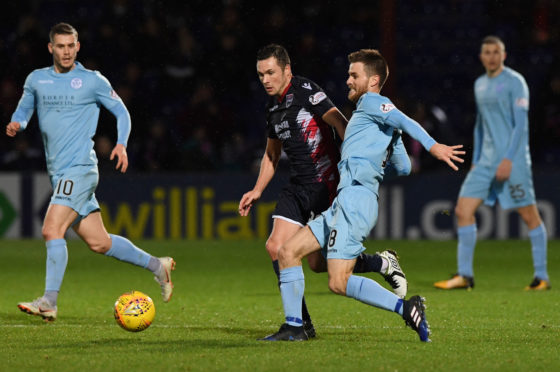 08/12/18 LADBROKES CHAMPIONSHIP
ROSS COUNTY V QUEEN OF THE SOUTH (1-1)
GLOBAL ENERGY STADIUM - DINGWALL
Ross County's Don Cowie (L) and Queen of the South's Kyle Jacobs compete for the ball