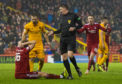 Sam Cosgrove was booked for diving by referee Craig Thomson.