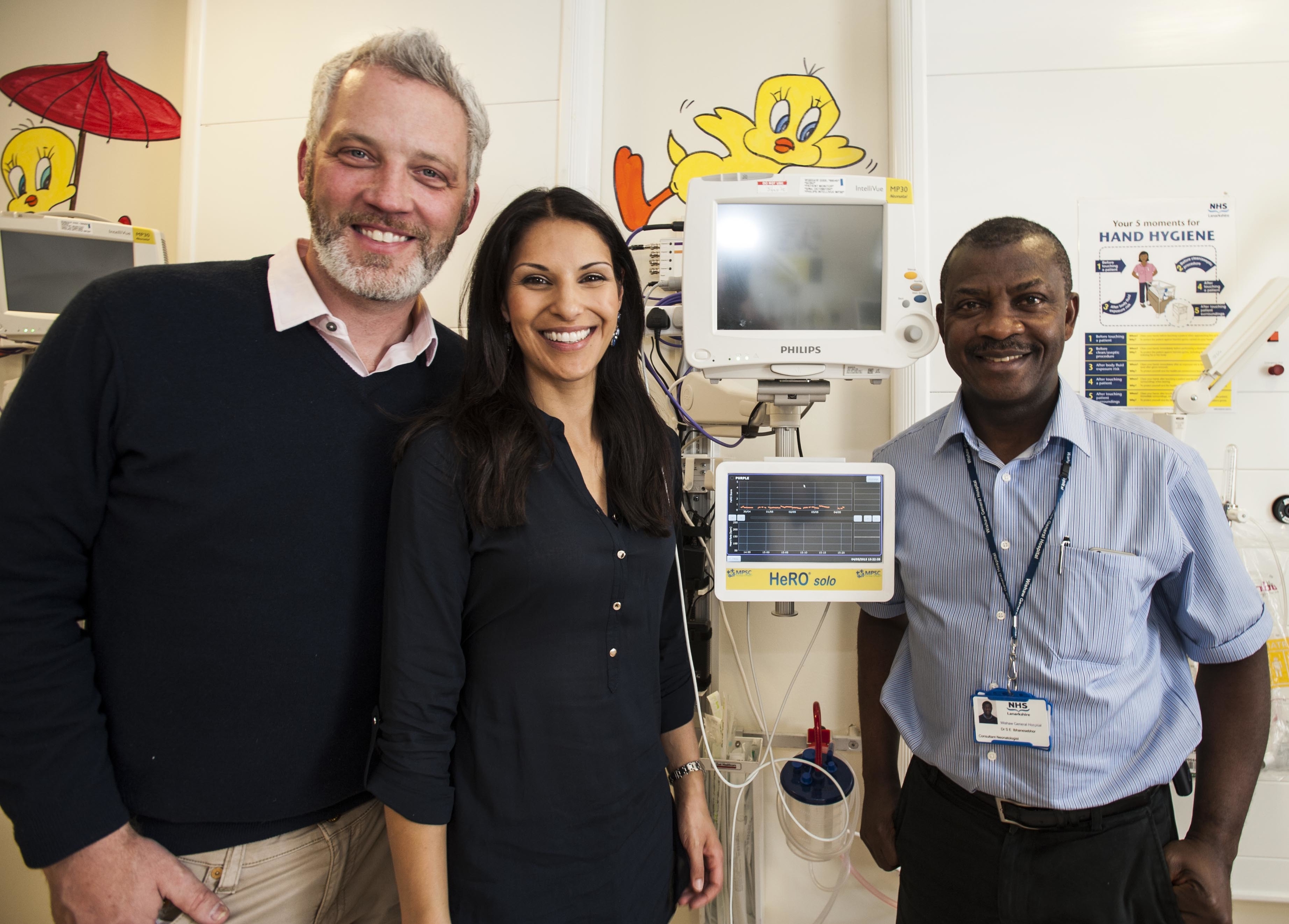 Nicola Wood and her husband Garreth Wood pictured with Dr Sam Ibhanesebhor, head of neonatal medicine at Wishaw General Hospital (right) after the couple donated Hero equipment to the Neo Natal Unit at Wishaw Hospital in 2015