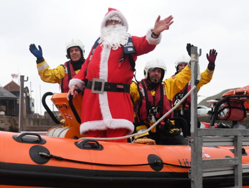Father Christmas arrived at Stonehaven with help from the RNLI.