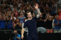 Andy Murray thanks the crowd after losing his first round match against Roberto Bautista Agut.
