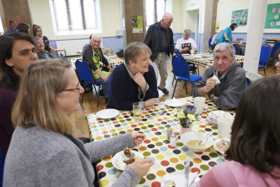 Residents attending Inverness Foodstuff at Ness Bank Church of Scotland before lockdown.