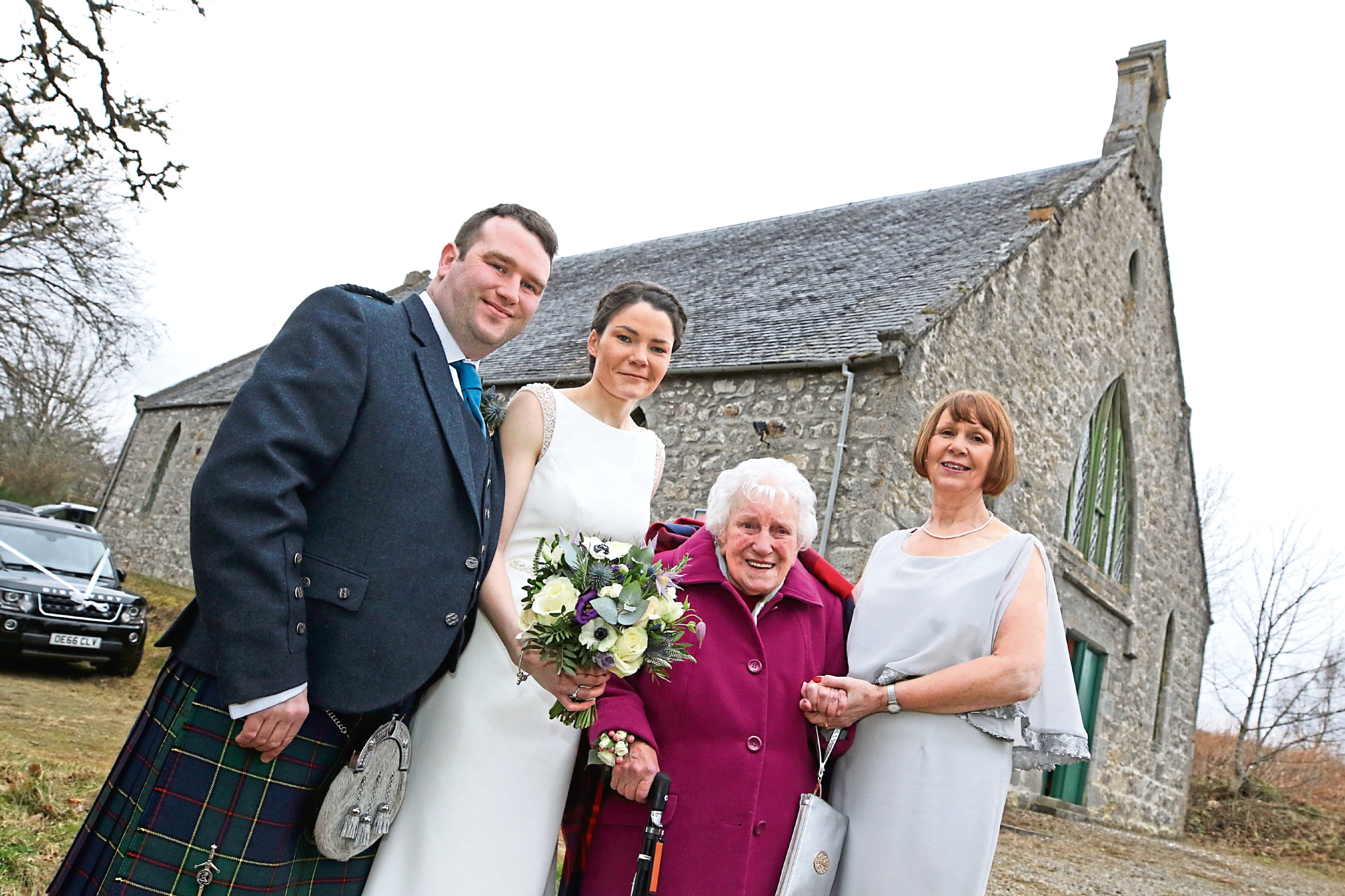From left: Michael Strachan and Michelle Macdonald, who got married on Saturday, Michelle's grandmother Sadie, and mum Catherine.