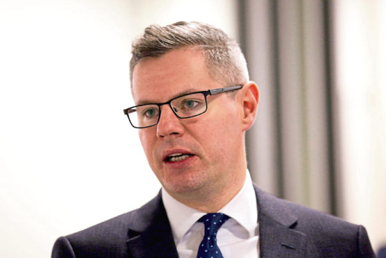 Economy Secretary Derek Mackay