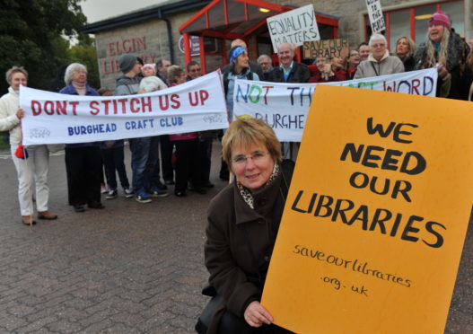 Campaigners pressed to save libraries across Moray in 2013.