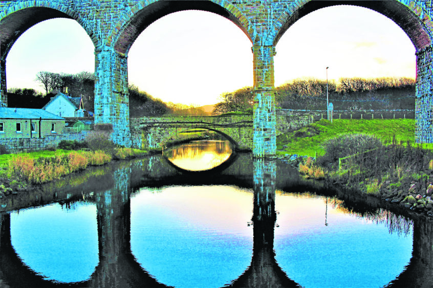 Sun going down through the Viaduct at Cullen. By Mairi Innes, Huntly.