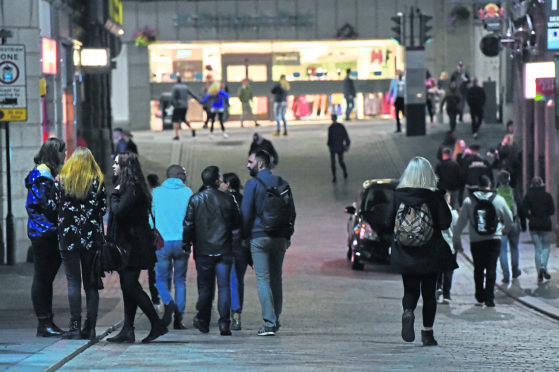 Revellers heading to clubs and pubs on Belmont Street, Aberdeen.