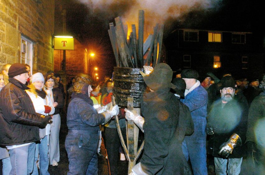 Photography by Sandy McCook,
'The Press and Journal'
Inverness
The burning Clavie is carried through the streets of Burghead on Saturday evening.
See story.
Date taken:10th Jan '04
. Photography by Sandy McCook,
'The Press and Journal'
Inverness
The burning Clavie is carried through the streets of Burghead on Saturday evening.
See story.
Date taken:10th Jan '04
.