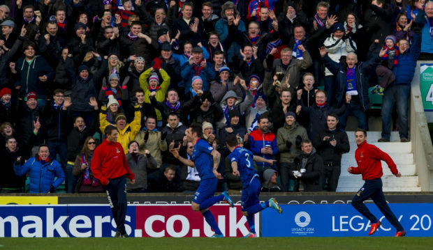 Greg Tansey celebrates in front of the Inverness supporters.