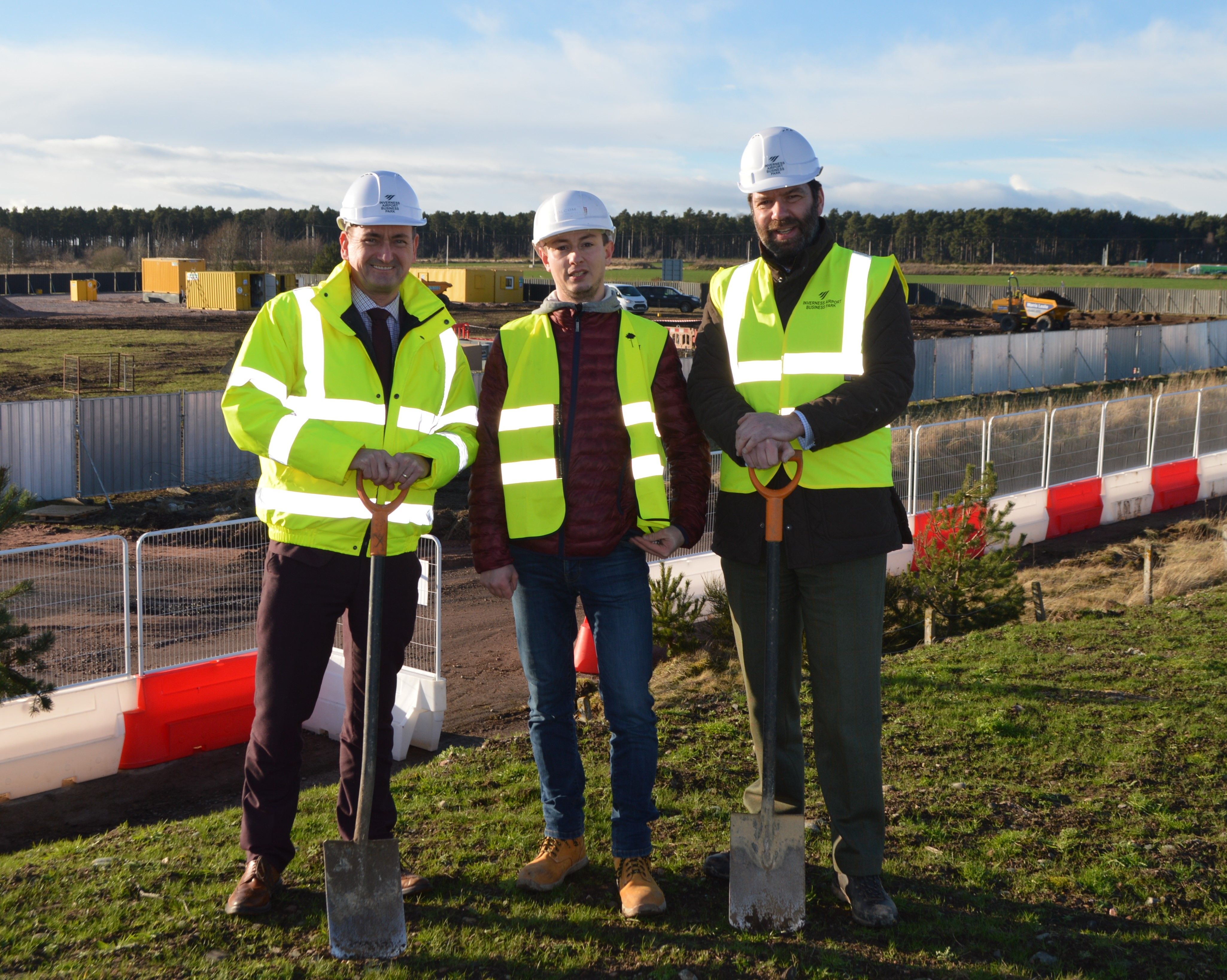General manager of Inverness Airport Graeme Bell, Polcom Construction Site manager Adam Weyna, and director of Inverness Airport Business Park Andrew Howard at the site as construction gets underway