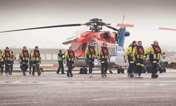 Offshore workers at Aberdeen heliport