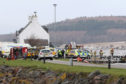 Police, fire and coastguard personnel during the major search operation near to Clachnaharry locks yesterday.