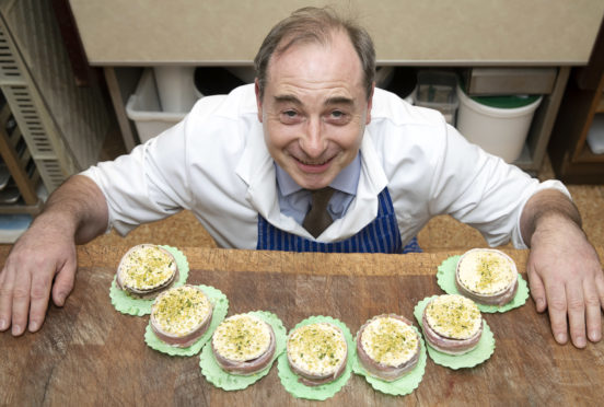 Donald Gilmour pictured with his Ruthven Stacks.