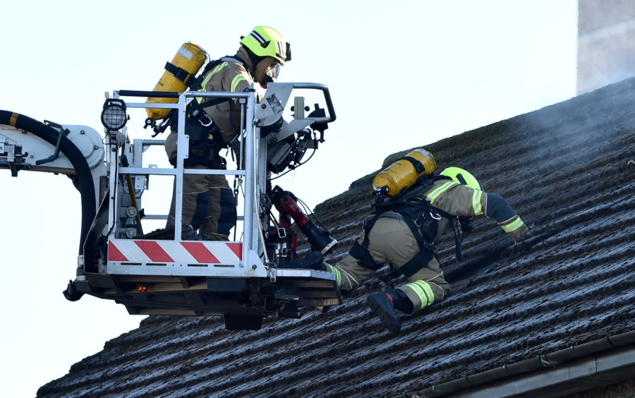 Scottish Fire and Rescue Service at the scene of a house fire on Mastrick Road, Aberdeen.