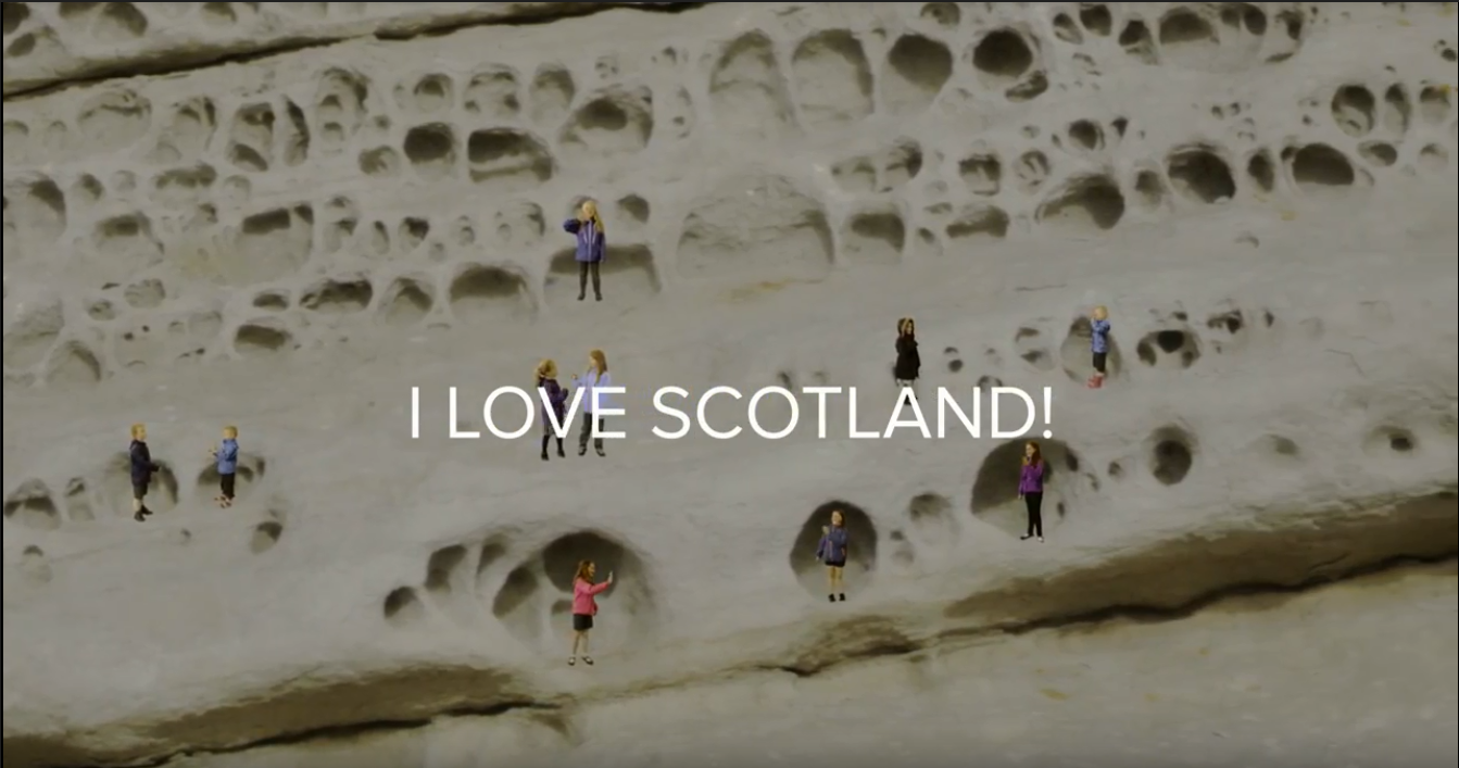 A screen grab of the Elgol pupils superimposed onto the famed honeycomb rock from the video.