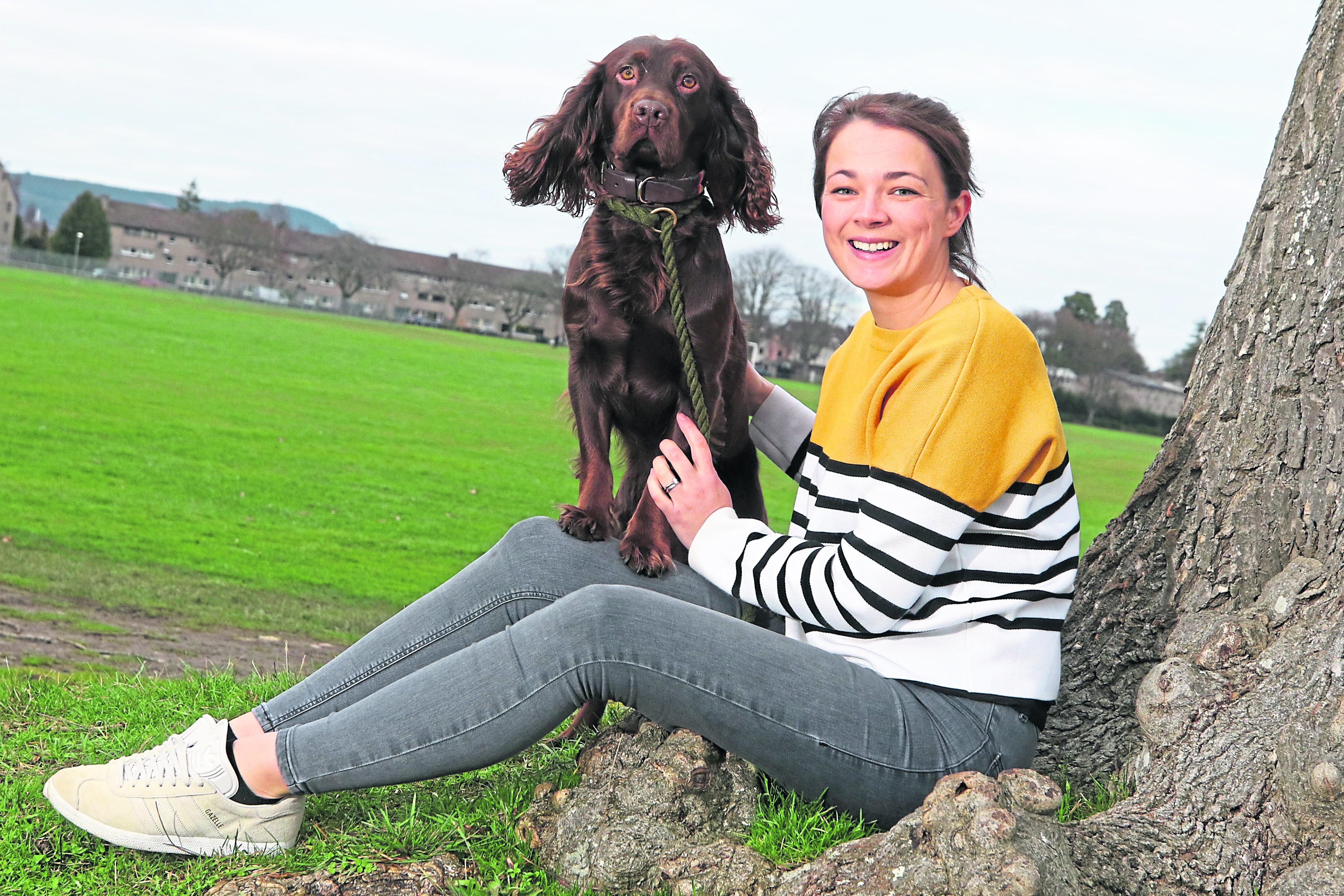 Fitness: Dr Anne Rennie, herself a keen long-distance runner, with her three-year-old cocker spaniel Winston at Bught Park in Inverness.