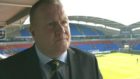 Scotland star, John McGinlay, has been banned by Bolton for criticising the chairman.