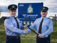Pictured here is Station Warrent Officer Milligan handing over his duties to the new Station Warrent Officer, WO Radcliffe