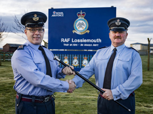 Pictured here is Station Warrent Officer Milligan handing over his duties to the new Station Warrent Officer, WO Radcliffe