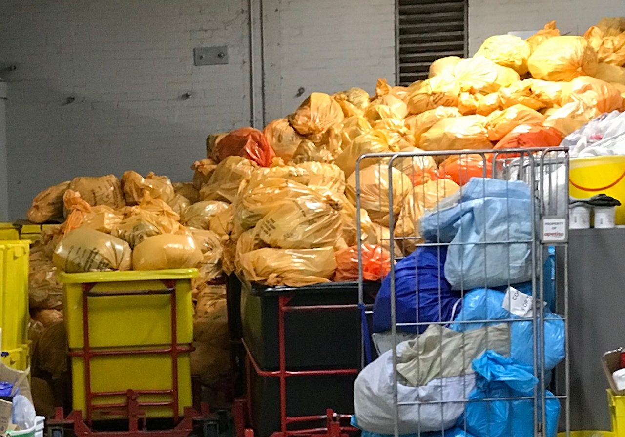 Piles of clinical waste spanning around 12 foot in height which NHS Highland porters have been forced to deal with