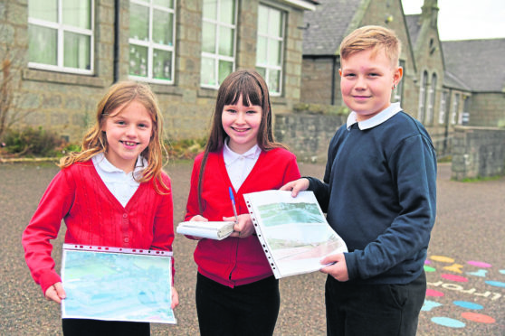 New Pitsligo Primary School pupils (l to r) Evie Smith, Lexie McGregor and Jake Adams