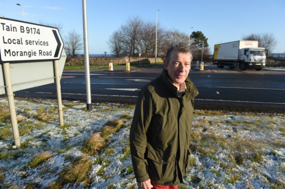 Campaigner Michael Baird at the northern junction from the A9 to Tain.
Picture by Sandy McCook.