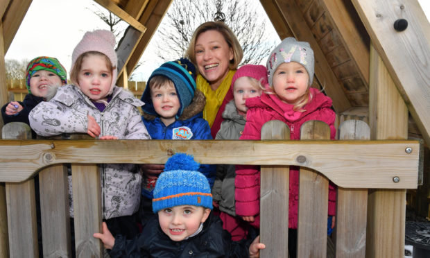 MSP GILLIAN MARTIN MEETS TODDLERS AT THE FLOWERPOTS NURSERY IN TURRIFF WHEN SHE FORMALLY OPENED IT.