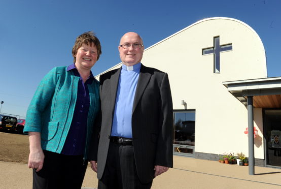 Rev Ian Ferguson with his wife Heather outside Westhill Community Church.
