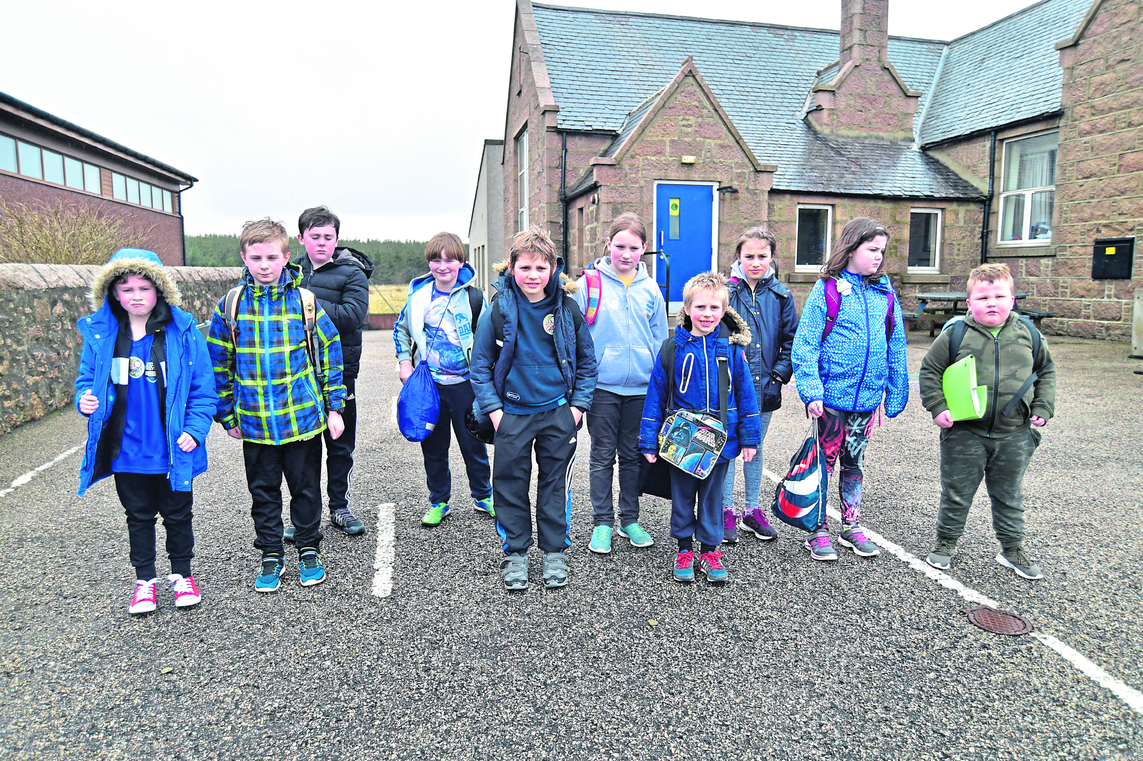 Mixed feelings as Longhaven pupils leave their school  for what is probably the last time.