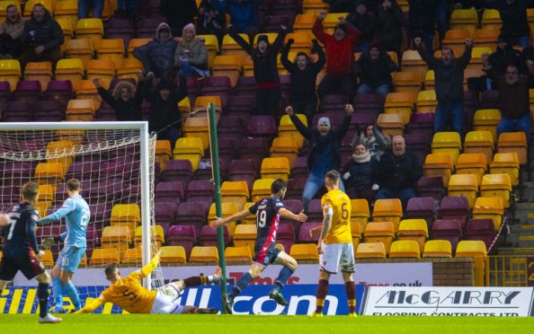 Ross County's Brian Graham wheels away after his second goal