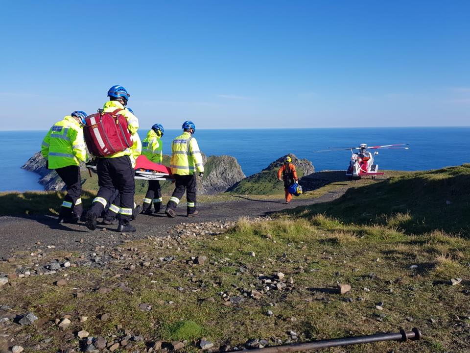 Coastguards abseiled down the sea cliffs of St Kilda.