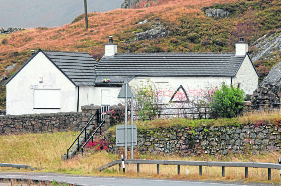 Grafitti on Jimmy Savile's former home in Glencoe.