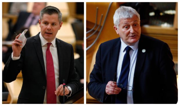 Debate over the Scottish budget: (Left) Derek Mackay and r(ight) John Finnie