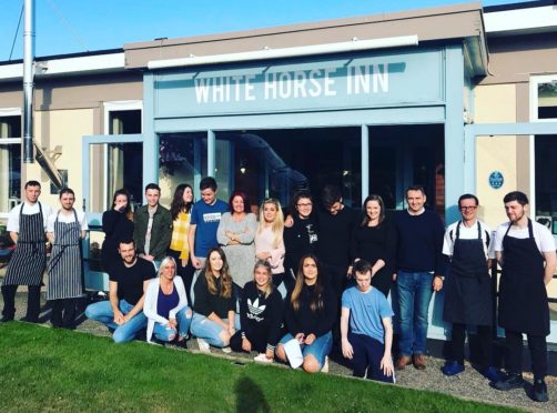 Staff outside the White Horse Inn