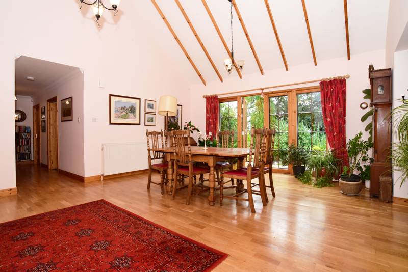 Dining Room: Features French doors lead out to the south facing garden