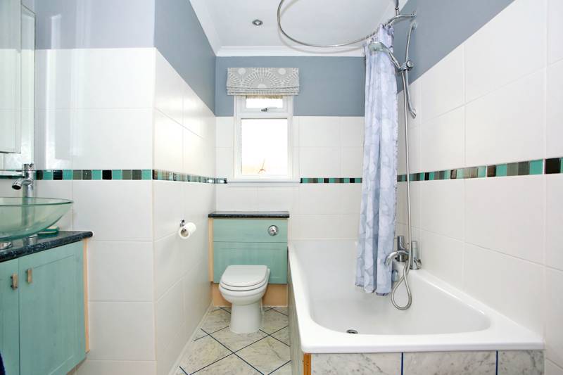 Family Bathroom: Fitted with three-piece suite