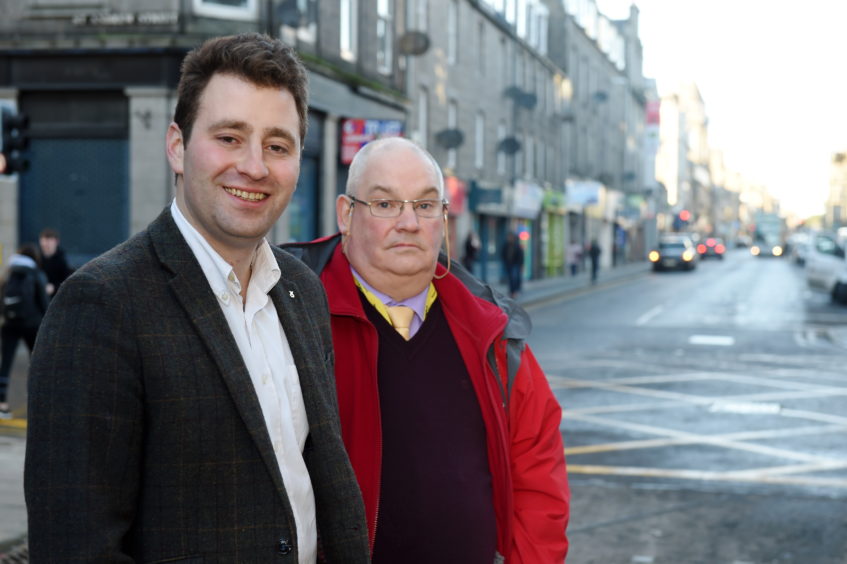SNP councillors Michael Hutchison and Dell Henrickson on George Street.